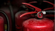 closeup-red-fire-extinguishers_53876-147842 1